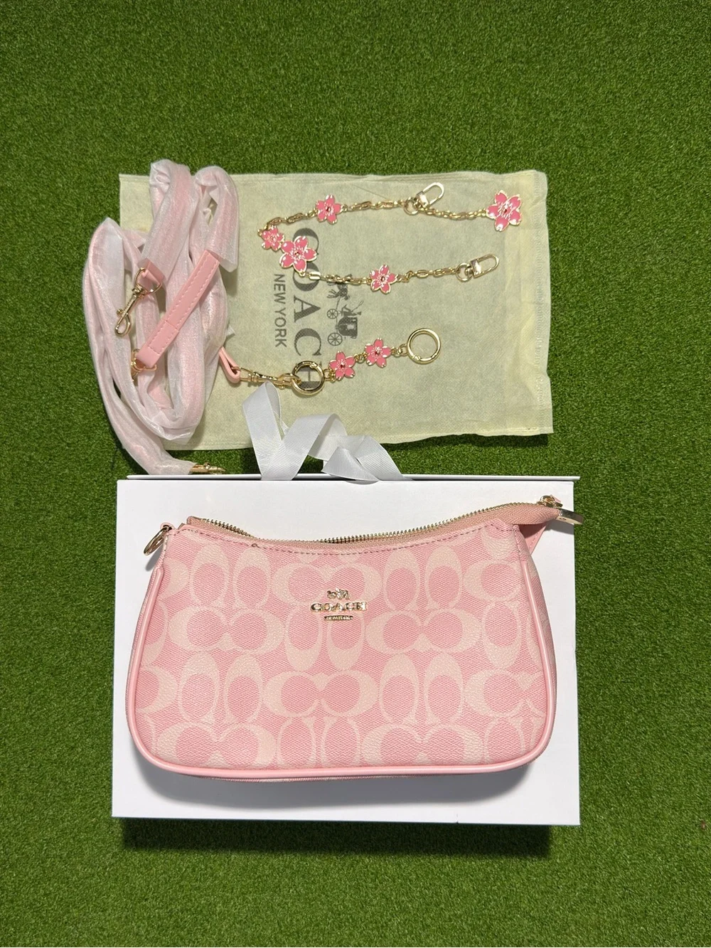 Coach Pink Signature Canvas Wristlet with Floral Charm Chain